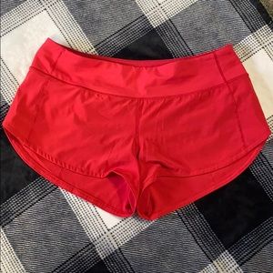 Red Lululemon shorts